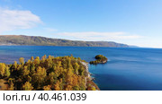Beautiful panorama of Lake Baikal in autumn. Shamansky Cape from the air. Прекрасная панорама озера Байкал осенью. Шаманский мыс с воздуха. Стоковое видео, видеограф Виктория Тельминова / Фотобанк Лори