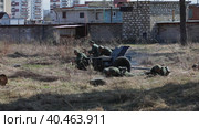 Reconstruction of the Second World War. German soldiers fire a cannon. The Great Patriotic War. Liberation of Odessa. Moscow Russia April 18, 2021. Редакционное видео, видеограф Юрий Поздников / Фотобанк Лори