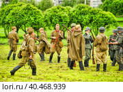 Soldiers in military uniform of the second world war at the historical reconstruction to the Day of the Border Guard. Стоковое фото, фотограф Анна Кривицкая / Фотобанк Лори