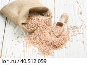 Raw Organic Devzira Rice on a white table. Стоковое фото, фотограф Виктория Панченко / Фотобанк Лори