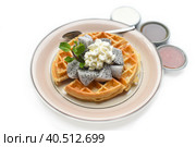 Plate of Belgium waffles with sliced dragon fruit and ice cream isolated on white background. Стоковое фото, фотограф Татьяна Терехина / Фотобанк Лори