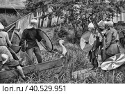 Russia, Staraya Ladoga, 24,06,2012 Festival of historical reconstruction "The First Capital of Russia", Drakar with Vikings. Редакционное фото, фотограф Анна Кривицкая / Фотобанк Лори
