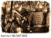Knights in armor during the battle at the Russian Fortress festival of historical reconstruction (2012 год). Редакционное фото, фотограф Анна Кривицкая / Фотобанк Лори