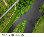 A riverbed with islands with a road and trees. Aerial photography from a drone. Стоковое фото, фотограф Ярославский Максим / Фотобанк Лори