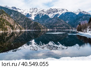 Lake Ritsa in the spring season. Located in Abkhazia, in the Caucasus Mountains. Стоковое фото, фотограф Ирина Кононова / Фотобанк Лори