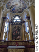 The transept with organ of the Cathedral of Assumption of Our Lady and Saint John the Baptist . Church is UNESCO World Heritage Site (2016 год). Редакционное фото, фотограф Анна Кривицкая / Фотобанк Лори
