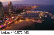 Drone view of the evening Barcelona, the capital of Catalonia, on the Mediterranean coast, Spain. Стоковое видео, видеограф Яков Филимонов / Фотобанк Лори