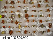 Estonia, Tallinn, 10,10,2014 Rings with amber for sale. Редакционное фото, фотограф Анна Кривицкая / Фотобанк Лори