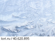 Frosty patterns on a frozen ice box in the early morning. Стоковое фото, фотограф Виктория Подгорная / Фотобанк Лори