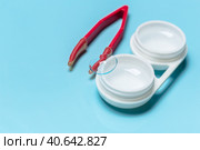 Container for contact lenses, tweezers, glass table. Стоковое фото, фотограф Сергей Толмачёв / Фотобанк Лори