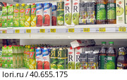 Russia, St. Petersburg 03,04,2014 Juices in packs on the supermarket shelf. Редакционное фото, фотограф Анна Кривицкая / Фотобанк Лори