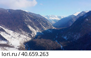 Горный Алтай зимой: Катунский хребет. Вид с воздуха. Altai mountains in winter: Katunsky ridge. Aerial view. Стоковое видео, видеограф Евгений Романов / Фотобанк Лори