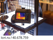 5 may 2023, Lisbon. Portugal - FIL Lisbon International Fair - Tektonica Lisbon: thermal imager at the expo. Редакционное фото, фотограф Константин Шишкин / Фотобанк Лори