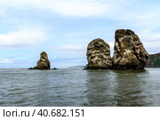 Seascape of Kamchatka Peninsula, view on Three Brothers Rocks in Avacha Bay (Avachinskaya Bay), Pacific Ocean, Russia. Стоковое фото, фотограф VittoriaChe / Фотобанк Лори