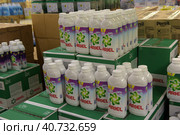 Finland, Imatra 23,12,2016 Washing powders and gels in the supermarket. Редакционное фото, фотограф Анна Кривицкая / Фотобанк Лори