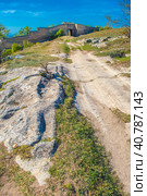 The remains of a medieval fortress city (according to other sources - a monastery) Tepe-Kermen, covering the upper part of the mountain in several tiers (2020 год). Редакционное фото, фотограф Анна Кривицкая / Фотобанк Лори
