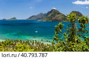 Corong Beach, El Nido, Palawan, Philippines amazing nature, panorama view of evergreen islands and blue lagoon with lonely boat (2019 год). Стоковое фото, фотограф Igor Tichonow / Фотобанк Лори