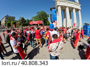 Football fans of the national team of Tunisia with national flags and attributes in fanzone fanfesta before the match England-Tunisia (2016 год). Редакционное фото, фотограф Сергей Сергеев / Фотобанк Лори