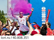 Football fans of the national team of Tunisia with national flags and attributes in fanzone fanfesta before the match England-Tunisia (2016 год). Редакционное фото, фотограф Сергей Сергеев / Фотобанк Лори
