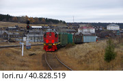 Тепловоз ТЭМ18ДМ-595, подъездной путь от ст. Кын, Пермский край (2021 год). Редакционное фото, фотограф Алексей Иванов / Фотобанк Лори