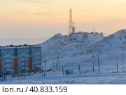 TV tower and satellite dishes on top of the mountain. Arctic industrial landscape. Telecommunications, digital television and the Internet in the Far North in the Arctic. Anadyr city, Chukotka, Russia. Стоковое фото, фотограф Андрей Степанов / Фотобанк Лори