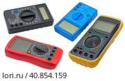 Цифровые мультиметры разного типа на белом фоне. Digital  multimeters on a white. Стоковое фото, фотограф Татьяна Д / Фотобанк Лори