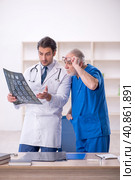 Two male doctors radiologists working in the clinic. Стоковое фото, фотограф Elnur / Фотобанк Лори