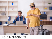 Old male boss and young male employee in summer vacation concept. Стоковое фото, фотограф Elnur / Фотобанк Лори