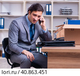 Young male employee being fired from his work. Стоковое фото, фотограф Elnur / Фотобанк Лори