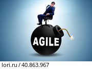 Agile concept with exploding bomb. Стоковое фото, фотограф Elnur / Фотобанк Лори