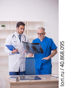 Two male doctors radiologists working in the clinic. Стоковое фото, фотограф Elnur / Фотобанк Лори