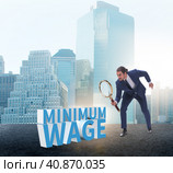 Concept of minimum wage with businessman. Стоковое фото, фотограф Elnur / Фотобанк Лори