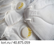 KN95 masks. Respirator, practical personal protective equipment. Several layers of the mask perfectly clean the inhaled air and effectively protect the respiratory tract from infection. Стоковое фото, фотограф Юлия Петровская / Фотобанк Лори
