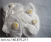 KN95 masks. Respirator, practical personal protective equipment. Several layers of the mask perfectly clean the inhaled air and effectively protect the respiratory tract from infection. Стоковое фото, фотограф Юлия Петровская / Фотобанк Лори