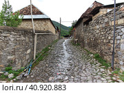 Kish, Azerbaijan - 12 Jul 2013. The stone road in Kish village, Azerbaijan. Редакционное фото, фотограф Сергей Стрелков / Фотобанк Лори