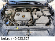 Engine of the Hyundai Tucson (2023 год). Редакционное фото, фотограф Art Konovalov / Фотобанк Лори