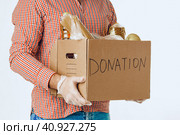 Donation box of food for people suffering from coronavirus pandemia. Стоковое фото, фотограф Сергей Толмачёв / Фотобанк Лори