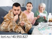 Sick man sitting with wife and mother. Стоковое фото, фотограф Яков Филимонов / Фотобанк Лори