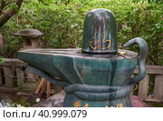 The methal Shiva Linga in Toganji temple. Nagoya. Japan (2019 год). Редакционное фото, фотограф Сергей Пристяжнюк (Serg Zastavkin) / Фотобанк Лори