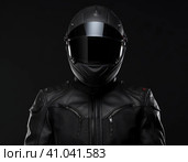 Biker in a modern helmet. Стоковое AI-изображение, AI-художник Кирилл Черезов / Фотобанк Лори