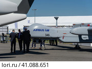 BERLIN, GERMANY - JUNE 23, 2022: Reconnaissance Medium-altitude long-endurance unmanned aerial vehicle IAI Eitan ("Steadfast"), also known as Heron TP. Exhibition ILA Berlin Air Show 2022. Редакционное фото, фотограф Sergey Kohl / Фотобанк Лори
