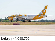 BERLIN, GERMANY - JUNE 23, 2022: Wide-body jet airliner Boeing 787-8 Dreamliner of Scoot airline. Редакционное фото, фотограф Sergey Kohl / Фотобанк Лори