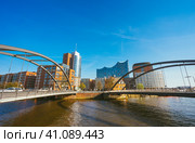 Hamburg, Germany - May 17, 2018: Niederbaumbrucke Bridge in HafenCity, Hamburg, Germany. Редакционное фото, фотограф Igor Tichonow / Фотобанк Лори