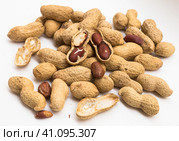 Bunch of ecological peanuts on a white background. Стоковое фото, фотограф Татьяна Яцевич / Фотобанк Лори