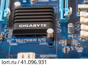 Плата с кулером для микрочипов GIGABYTE. Редакционное фото, фотограф Valeryi Vysotkov / Фотобанк Лори