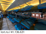 BERLIN, GERMANY - APRIL 25, 2018: Interior of the salon for evacuation and first aid to the wounded of transport Airbus A310-900 MRTT MedEvac "Hermann Kohl". German Air Force. Exhibition ILA Berlin Air Show 2018. Редакционное фото, фотограф Sergey Kohl / Фотобанк Лори