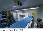 BERLIN, GERMANY - APRIL 25, 2018: Locations of operators of radio intelligence of Boeing E-3A Sentry AWACS. Exhibition ILA Berlin Air Show 2018. Редакционное фото, фотограф Sergey Kohl / Фотобанк Лори