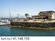PLAYA BLANCA, LANZAROTE - JULY 18, 2022: Marina Rubicon of Playa Blanca. Playa Blanca is the southernmost town of the Spanish island of Lanzarote. It is the newest resort on the island. Редакционное фото, фотограф Sergey Kohl / Фотобанк Лори