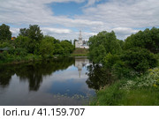 View of the Church of Cosmas and Damian on Yarunova Hill (Kozmodemyanskaya Church) on the bank of the Kamenka River on a sunny summer day, Suzdal, Vladimir region, Russia. Стоковое фото, фотограф Ula Ulachka / Фотобанк Лори