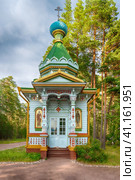 Konevets Island, Russia - 22 July 2023: Chapel of the Assumption of the Mother of God, wooden structure of 1899. Редакционное фото, фотограф Оксана Медведева / Фотобанк Лори